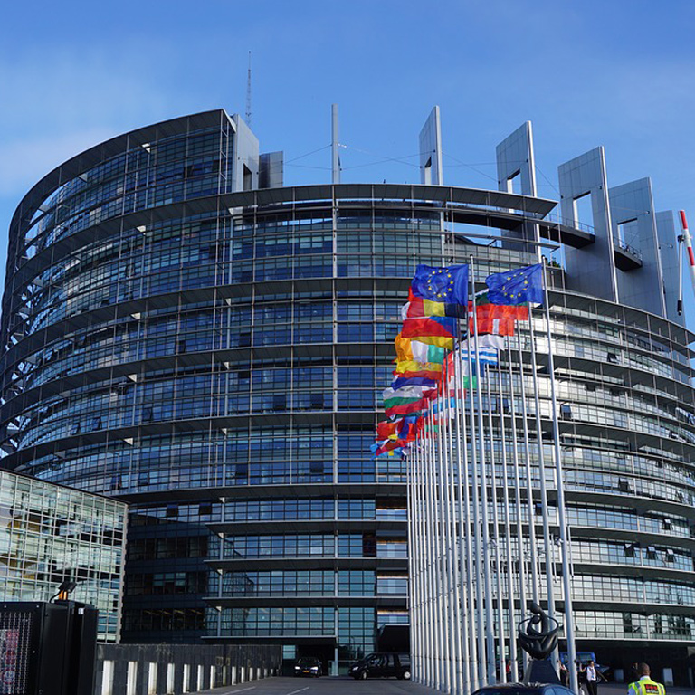 European union building with flags of nations
