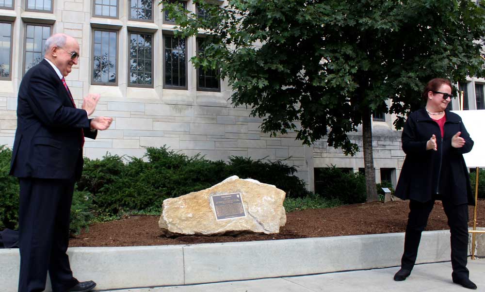 Indiana University President Michael McRobbie and Provost Lauren Robel unveil the marker to the late Elinor Ostrom.